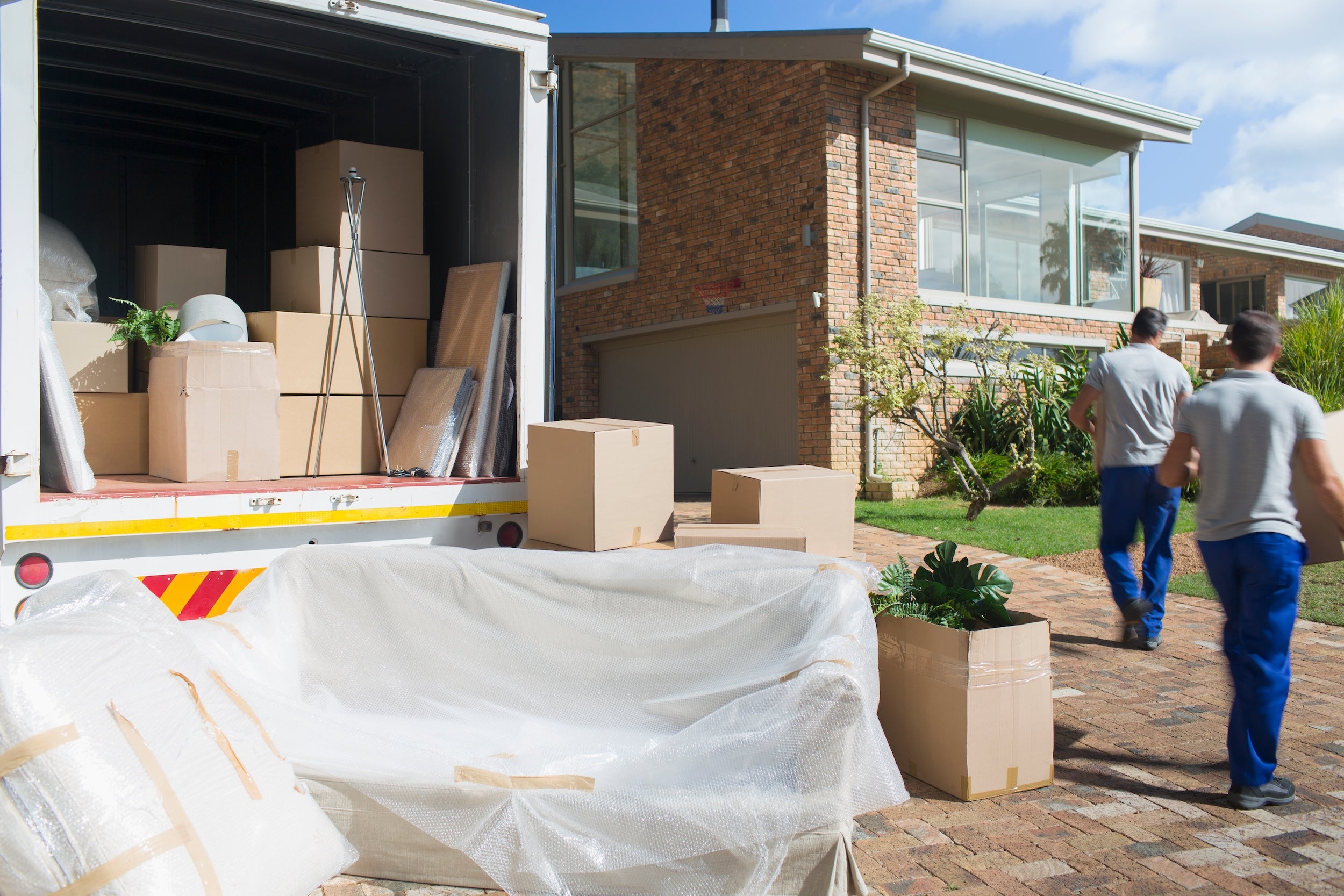 Movers unloading truck